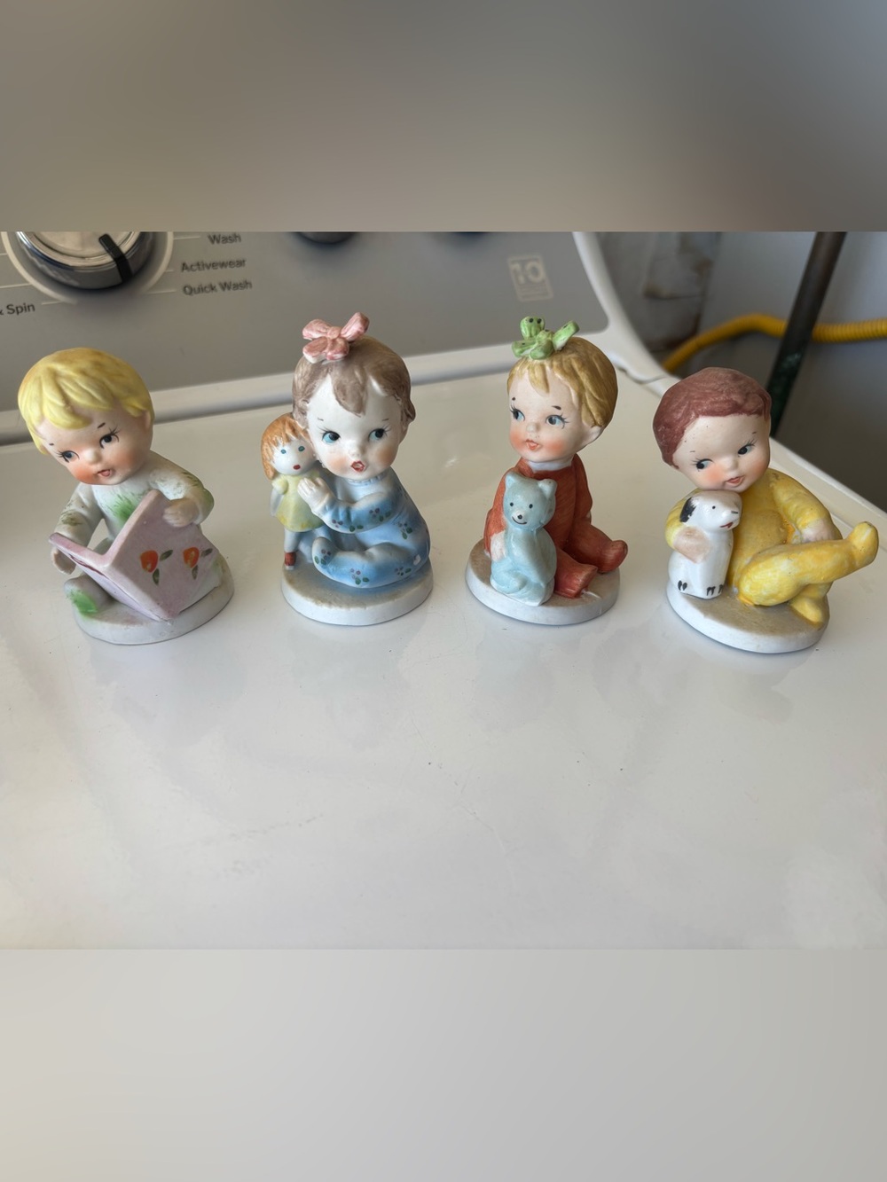 Set of 4 Porcelain figurines